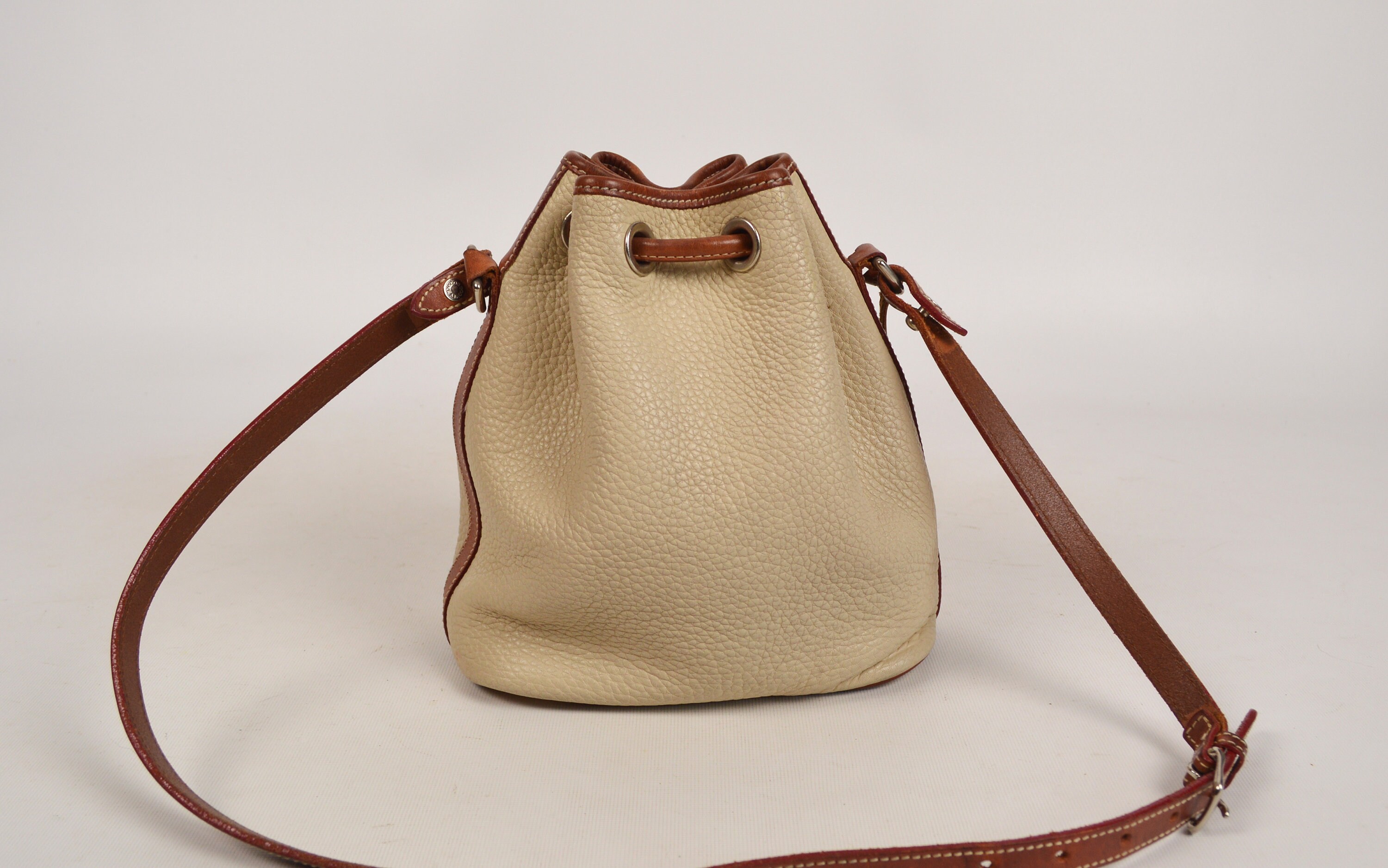 Dooney & Bourke Elegant Cream and Tan Leather Bucket Bag Dooney & Bourke Vintage All-Weather Leather | Mercari main image 4