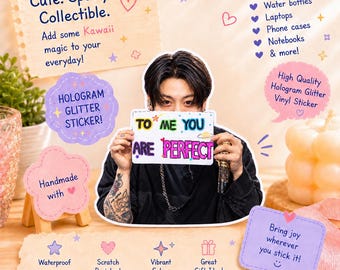 May include: A rectangular hologram glitter vinyl sticker featuring the text TO ME YOU ARE PERFECT in colorful, stylized lettering. The sticker includes small graphic elements like a star and a fried egg, designed with a vibrant, shimmering finish.