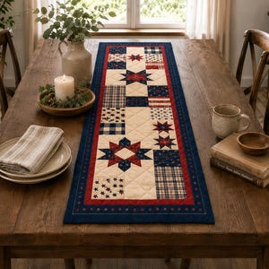 May include: A rectangular table runner featuring a patchwork design with red, white, and blue colors. The fabric displays star motifs, plaid patterns, and small star prints, all bordered by a solid red band and a wide navy blue outer edge.