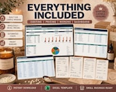 A computer monitor displays a "Candle Pricing Dashboard" spreadsheet, with multiple smaller spreadsheet printouts and candle-making items arranged around it.