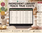A laptop displays an "Ingredient Library" spreadsheet with columns for ingredient, cost, and unit, set on a kitchen counter with flour, sugar, and butter.