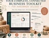 A laptop displaying a handmade business dashboard rests beside printed inventory sheets and gift boxes.