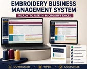 A laptop and a tablet both display the "Embroidery Business Management System" interface, with spools of thread and a printed quick start guide on the table.