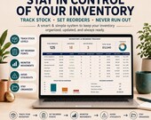 A laptop displaying the inventory and reorder tracker spreadsheet alongside key metrics and stock status lists.