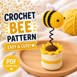 May include: A crocheted bee with black and yellow stripes and white wings attached to a black spring, which is mounted on a crocheted sunflower and a cylindrical base. The text reads CROCHET BEE PATTERN EASY & CUTE! and PDF DOWNLOAD.