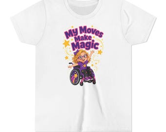 May include: A white short-sleeved t-shirt featuring a graphic of a person with blonde hair and glasses in a wheelchair. The text reads "My Moves Make Magic" in purple letters, surrounded by yellow stars and swirling lines on a dark background.