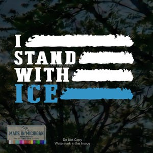 May include: A rectangular decal featuring the white text I STAND WITH in a bold serif font, followed by the word ICE in a blue serif font. Each line of text is accompanied by a horizontal brushstroke graphic in white, with the final line in blue.