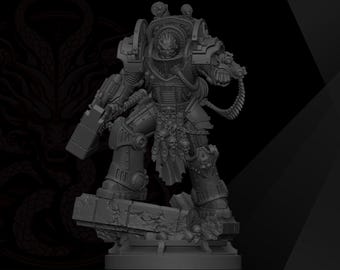May include: A grey miniature figure of a heavily armoured warrior standing on a stone base. The figure wears ornate power armour with skull decorations, a loincloth, and holds a large hammer in one hand, with cables connecting to the armour.