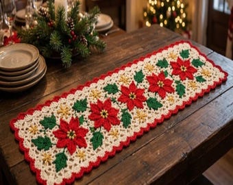 May include: A rectangular crochet table runner featuring a cream-colored base with a repeating pattern of red poinsettia flowers, green leaves, and small yellow star-like accents, finished with a scalloped red border edge.
