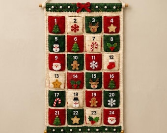 May include: A crocheted Christmas advent calendar wall hanging featuring twenty-four numbered pockets in red, green, and cream. Each pocket displays a unique holiday-themed applique, including a snowman, reindeer, gingerbread man, and Santa Claus.