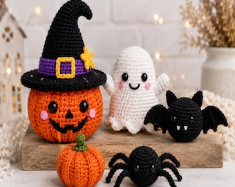 May include: A set of five crocheted Halloween decorations including a large orange pumpkin wearing a black witch hat with a purple band and yellow star, a white ghost, a small orange pumpkin, a black bat, and a black spider with eight legs.