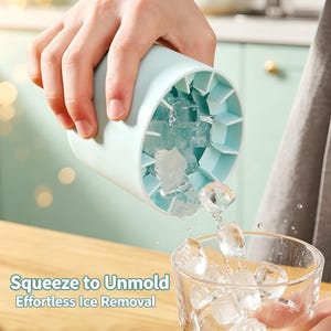May include: A light blue cylindrical ice cube mold with internal dividers being tilted to release clear ice cubes into a glass. The text Squeeze to Unmold Effortless Ice Removal is printed on the lower left side of the image.