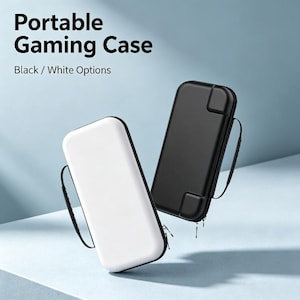May include: Two portable gaming cases, one in white and one in black, featuring a rectangular shape with rounded corners, a smooth hard-shell exterior, and a black carrying strap attached to the side. Text reads: Portable Gaming Case Black / White Options.