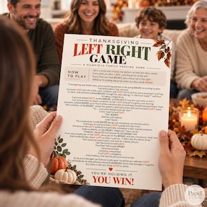 May include: A Thanksgiving Left Right Game card featuring a printed story with instructions, decorated with autumn leaves and pumpkins. The text includes the title, how to play, the story with highlighted words, and the final phrase You Win.
