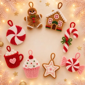 May include: A collection of eight crocheted Christmas ornaments arranged in a circle, including a gingerbread person, a house, a candy cane, a peppermint swirl, a mug with marshmallows, a cupcake, a star, and a wrapped candy, all with hanging loops.