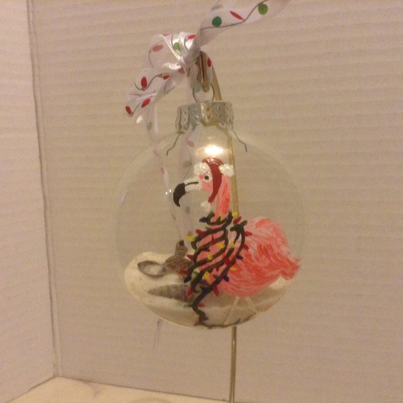 Ornament, Glass, Pink Flamingo With Lights Draped Around His Neck and a