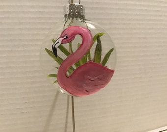Ornament, glass, pink flamingo with leaves on the back.