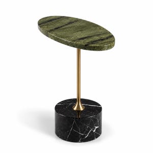 May include: An oval side table featuring a green marble top with dark veining, supported by a slender gold-toned metal pedestal base that connects to a cylindrical black marble base with white veining, creating a tiered, multi-material structure.