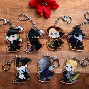 K&ouml;nnte beinhalten: Set mit 8 Schl&uuml;sselanh&auml;ngern im Anime-Stil. Jeder Schl&uuml;sselanh&auml;nger zeigt einen anderen Charakter mit einem einzigartigen Design und Farbschema. Die Schl&uuml;sselanh&auml;nger sind aus klarem Acryl gefertigt und haben eine silberne Metallkette.