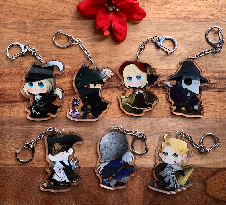 K&ouml;nnte beinhalten: Set mit 8 Schl&uuml;sselanh&auml;ngern im Anime-Stil. Jeder Schl&uuml;sselanh&auml;nger zeigt einen anderen Charakter mit einem einzigartigen Design und Farbschema. Die Schl&uuml;sselanh&auml;nger sind aus klarem Acryl gefertigt und haben eine silberne Metallkette.