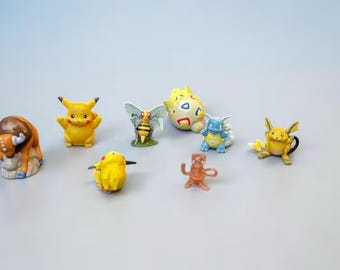 Vintage Pokémon Figure Lot, Collectible Toys, Tauros, Pikachu (2 figures), Beedrill, Togepi, Wartortle, Raichu, Mew