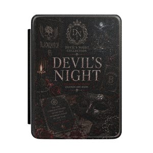 May include: A black e-reader case featuring a textured surface with the text Devil's Night Collection, Devil's Night, and Legends Are Made. The design includes a skull, a candle, a masquerade mask, and an invitation card with ornate details.