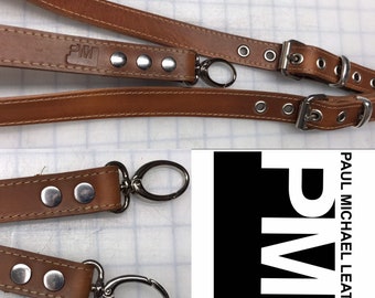 Natural leather suspenders with oval trigger snaps
