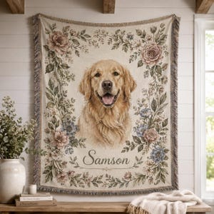 Personalized woven pet portrait blanket with golden retriever named Samson, vintage floral border, and fringe edge displayed as wall decor.