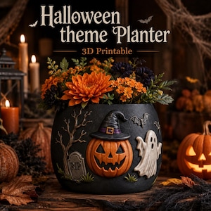May include: A black cylindrical planter featuring embossed Halloween imagery including a jack-o'-lantern wearing a witch hat, a ghost, a tombstone with the text RIP, and a bare tree. The planter is filled with orange and dark purple flowers.