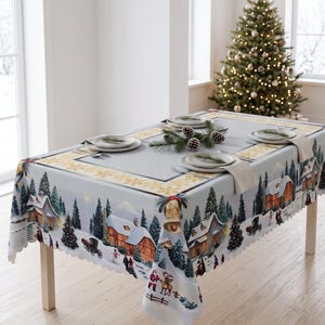May include: A rectangular tablecloth featuring a winter village scene with snow-covered houses, pine trees, horse-drawn carriages, and Santa Claus with a reindeer. The border includes golden bells and snowflakes on a light gray background.