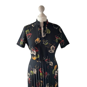 Black 1970s Dress with Autumn Leaf Design and Accordion Pleat Skirt