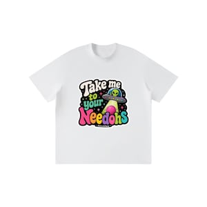 May include: A white short-sleeve t-shirt featuring a colorful graphic of a green alien in a flying saucer beaming down a pink sphere. The text reads Take me to your Needohs in bold, multi-colored lettering against a dark starry background.