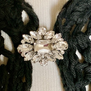 The mattie rhinestone flower sweater clip brooch