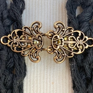 The mattie soft antiqued gold tone metal Celtic sweater clasp brooch