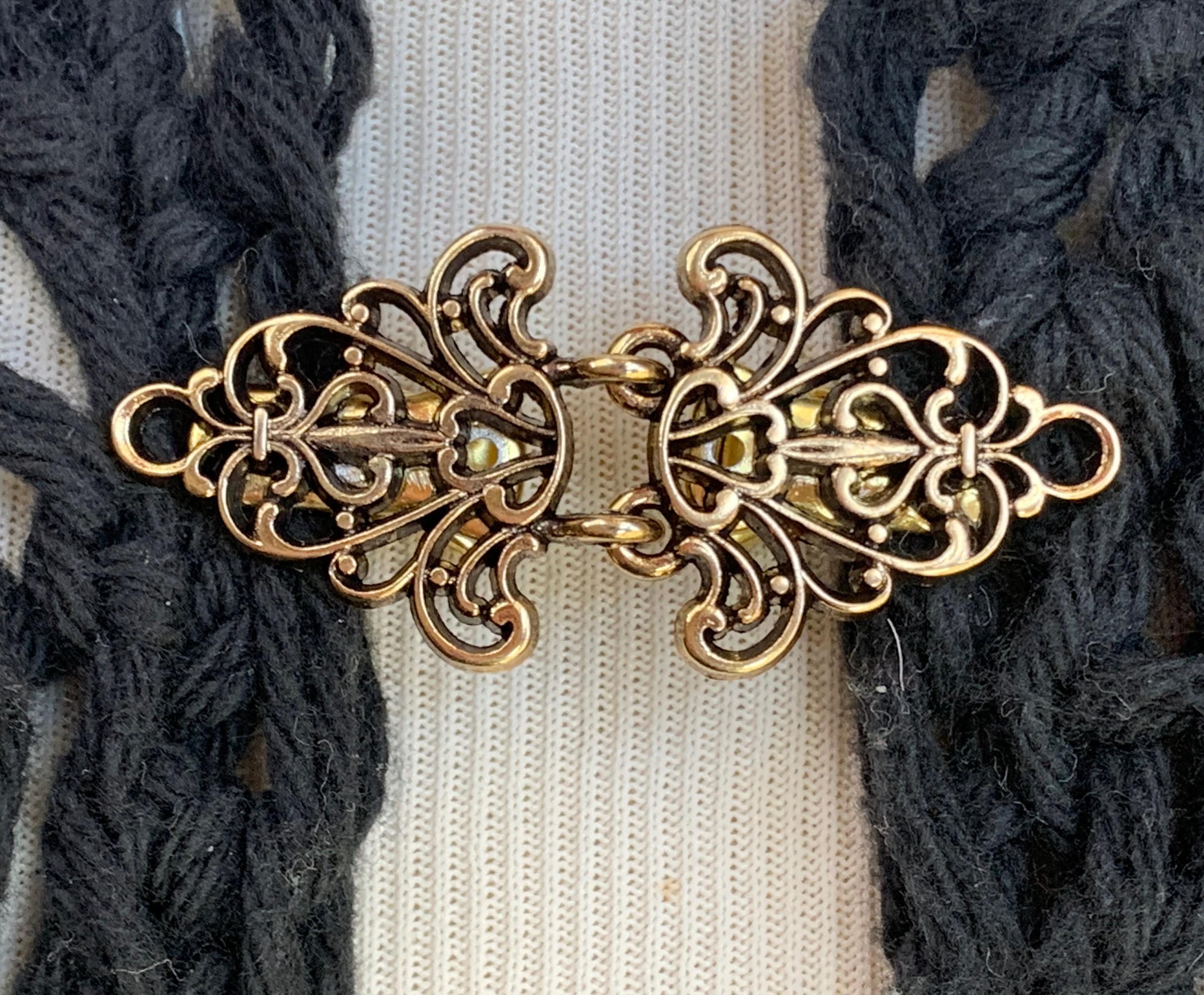 VINTAGE SWEATER CLIP WITH BUTTERFLY DESIGN. STAINLESS STEEL.