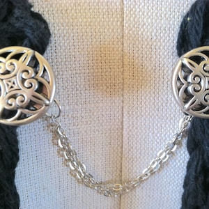 The mattie  silver tone Celtic inspired sweater clip.
