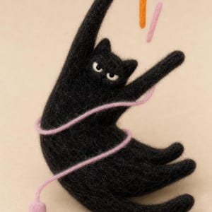 May include: A needle-felted black cat figurine with a curved body, white eyes with black pupils, and a pink electrical cord wrapped around its torso. The cord ends in a pink plug, and two small felted sticks in orange and pink float above.
