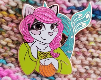 Spinning Mermaid Fibers Pin is here! 2x2” with glitter. Limited quantities