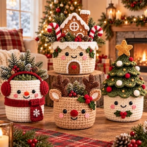 May include: A collection of four crocheted holiday baskets featuring a gingerbread house, a snowman with red earmuffs and a scarf, a reindeer with brown antlers, and a Christmas tree topped with a yellow star, all decorated with festive accents.