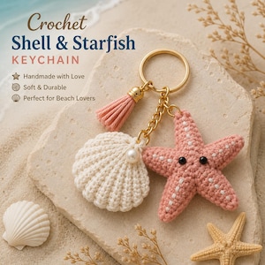 May include: A crochet keychain featuring a cream-colored seashell and a pink starfish with black bead eyes. The charms are attached to a gold-tone metal ring with a small pink tassel and a white pearl accent. Text reads Crochet Shell & Starfish KEYCHAIN.