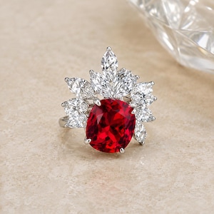 6,50 ct kuddring med naturlig rubin och diamant i 14 karat vitt guld (importfri)
