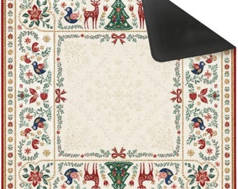 May include: A square mat with a cream-colored center featuring a subtle floral pattern. The border displays a festive print of red reindeer, green Christmas trees, blue birds, red bows, and floral vines. One corner is folded to reveal a black underside.