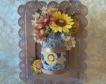 Rustic Metal Tin Punched with attached Bottle and Flowers with Fairy Lights around the Metal Frame