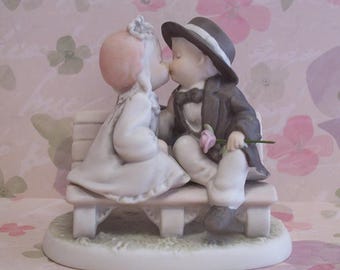 1997 Enesco Alaska Momma “Monday's Child Is Fair of Face Gentle and Caring Of Nature's Embrace