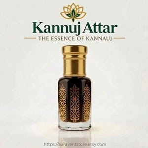 May include: A glass perfume bottle with a gold cap and dark liquid inside, featuring a gold floral pattern on the front. Above the bottle, the text reads Kannuj Attar and The Essence of Kannuj, with a lotus flower icon centered above.