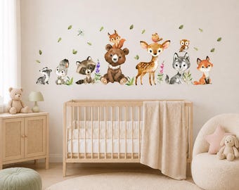 May include: A set of wall decals featuring watercolor illustrations of a badger, rabbit, raccoon, bear with a fox on its head, deer with a bird on its head, owl, and another fox, all surrounded by small green leaves and purple flowers.