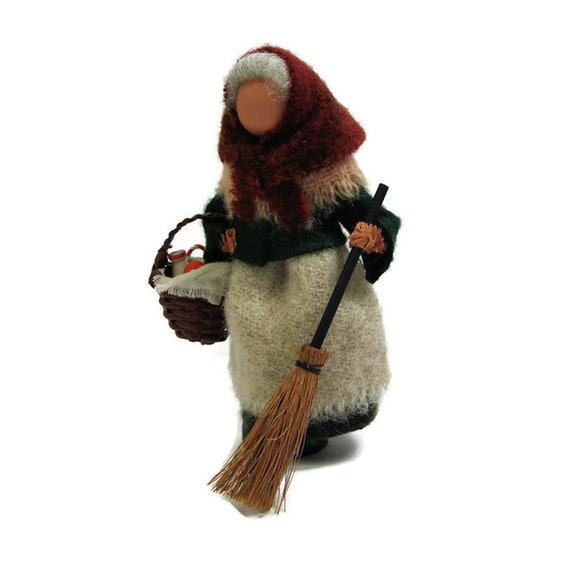 Befana Old Woman Flying On A Broomstick With A Basket Of Gifts For