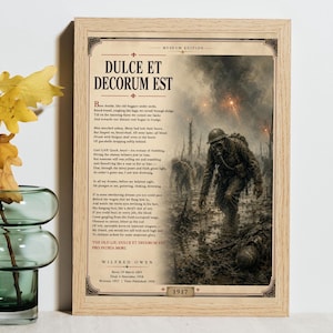 May include: A framed print featuring the poem Dulce Et Decorum Est by Wilfred Owen, with a central illustration of a soldier in a gas mask walking through a muddy, smoke-filled battlefield. The text includes the poem, author details, and 1917.