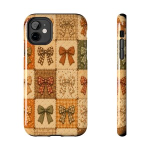 May include: A smartphone case featuring a patchwork quilt design with various bow patterns in shades of brown, orange, cream, and green. The case displays a grid of squares, each containing a different bow illustration, with a camera cutout.