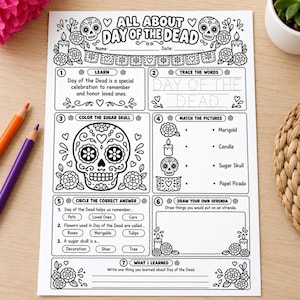 May include: A black and white educational activity worksheet titled All About Day of the Dead. The page features sections for tracing words, coloring a sugar skull, matching pictures to labels, circling correct answers, and drawing an ofrenda.